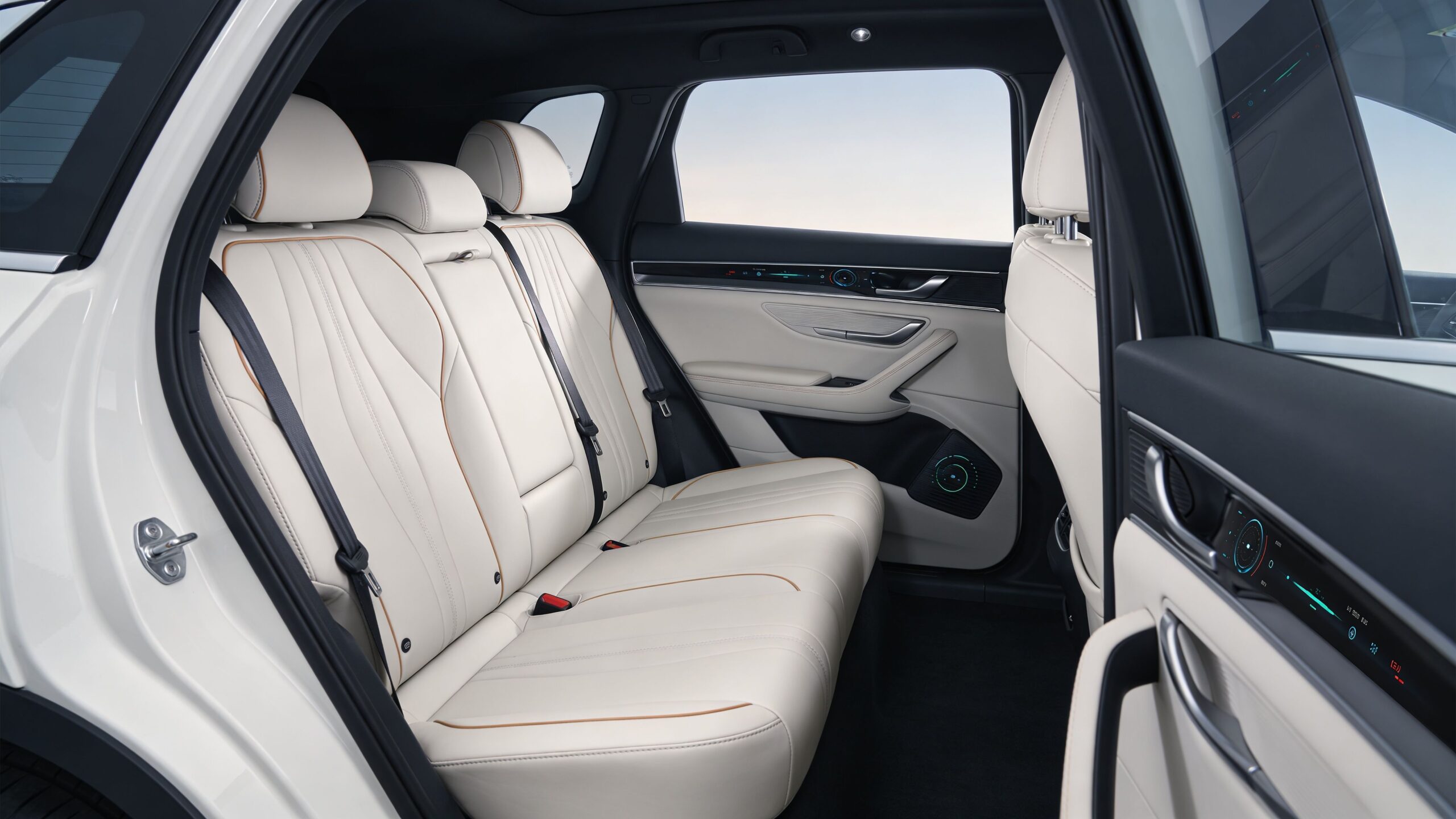 A modern and luxurious white leather backseat interior of a premium elite transportation service SUV vehicle.